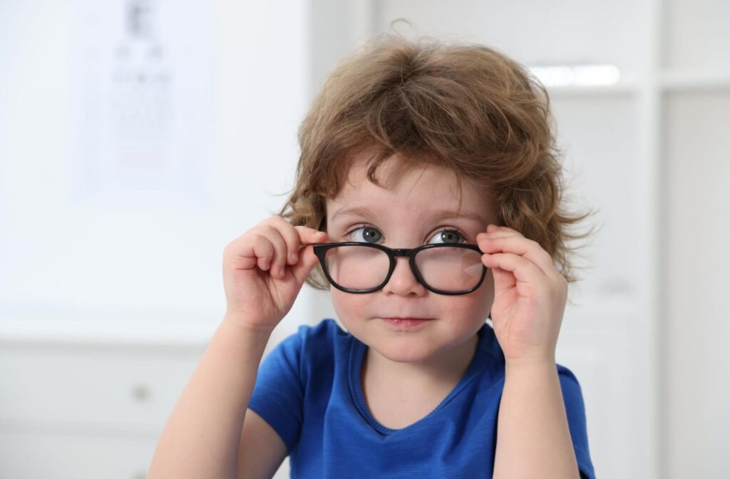 Young child wearing eyeglasses, representing early myopia correction.